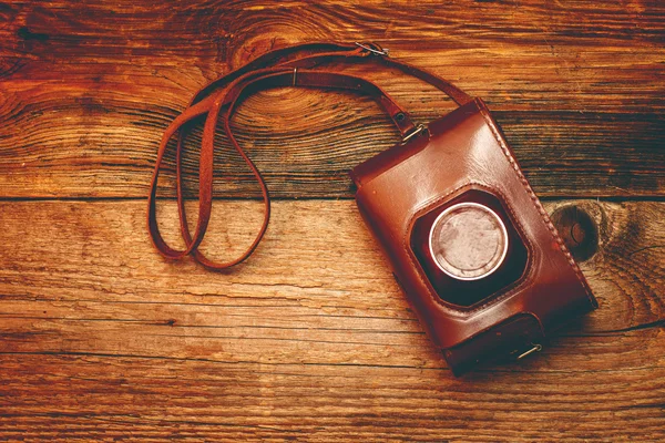 Vintage camera on wooden background — Stock Photo, Image