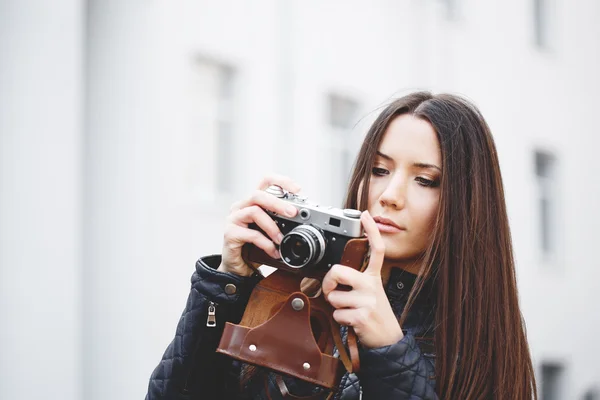 Portrait of a beautiful adult sensual woman with camera. — Stock Photo, Image