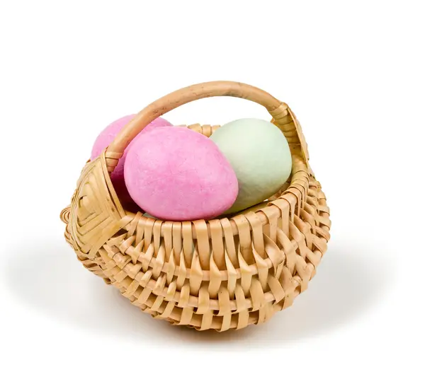 Marzipan Easter eggs in a basket — Stock Photo, Image