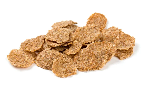 Pile of bran flakes isolated on white — Stock Photo, Image