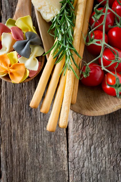 pasta, cheese, bread and tomatoes