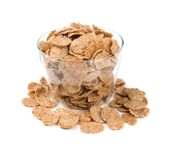 Pile of bran flakes isolated on white — Stock Photo, Image