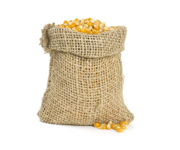 Yellow corn grain in a burlap bag Stock Photo by ©tpzijl 107779202