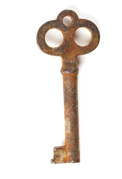 Old rustic key over white — Stock Photo, Image