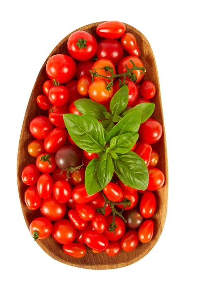 在白色上分离出来的各种微型西红柿 — 图库照片