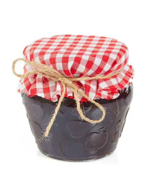 Beyaz arkaplanda izole edilmiş güzel bir kavanoz reçel