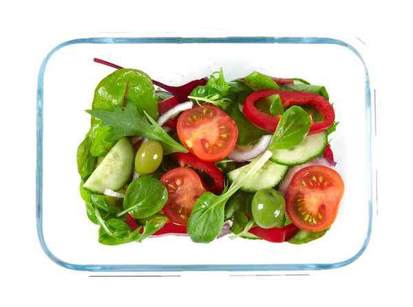 vegetable salad in a glass container isolated on white background