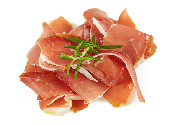 Prosciutto crudo isolated on white background. Italian or Spanish traditional dried meat.