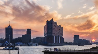 Hamburg architecture across the river at sunrise clipart