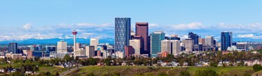 Panorama of Calgary and Rocky Mountains clipart