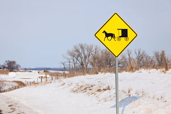 Amish carriage on the road sign — Stock Photo, Image