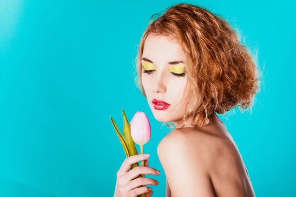 Young girl with tulip — Stock Photo, Image