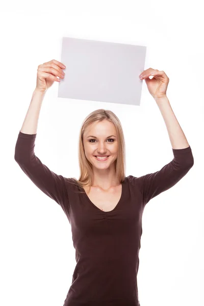Smiling woman show blank Stock Picture