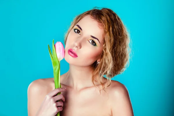 Young girl with tulip — Stock Photo, Image