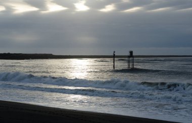 Westhaven Eyalet Parkı, Gras Limanı 'ndaki Half Moon Körfezi üzerinde mavi gün batımı