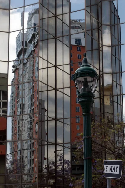 Whimsical Reflections Glass Wall Little Italy Building Street Lamp Front — стокове фото