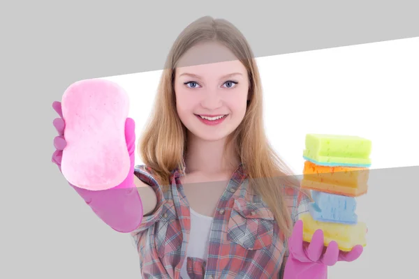 Attractive woman cleaning glass with pink sponge — Stock Photo, Image