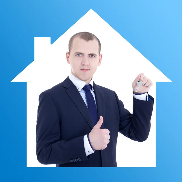 Immobilien-Konzept - Geschäft Mann Makler mit Schlüssel in Hand thum — Stockfoto