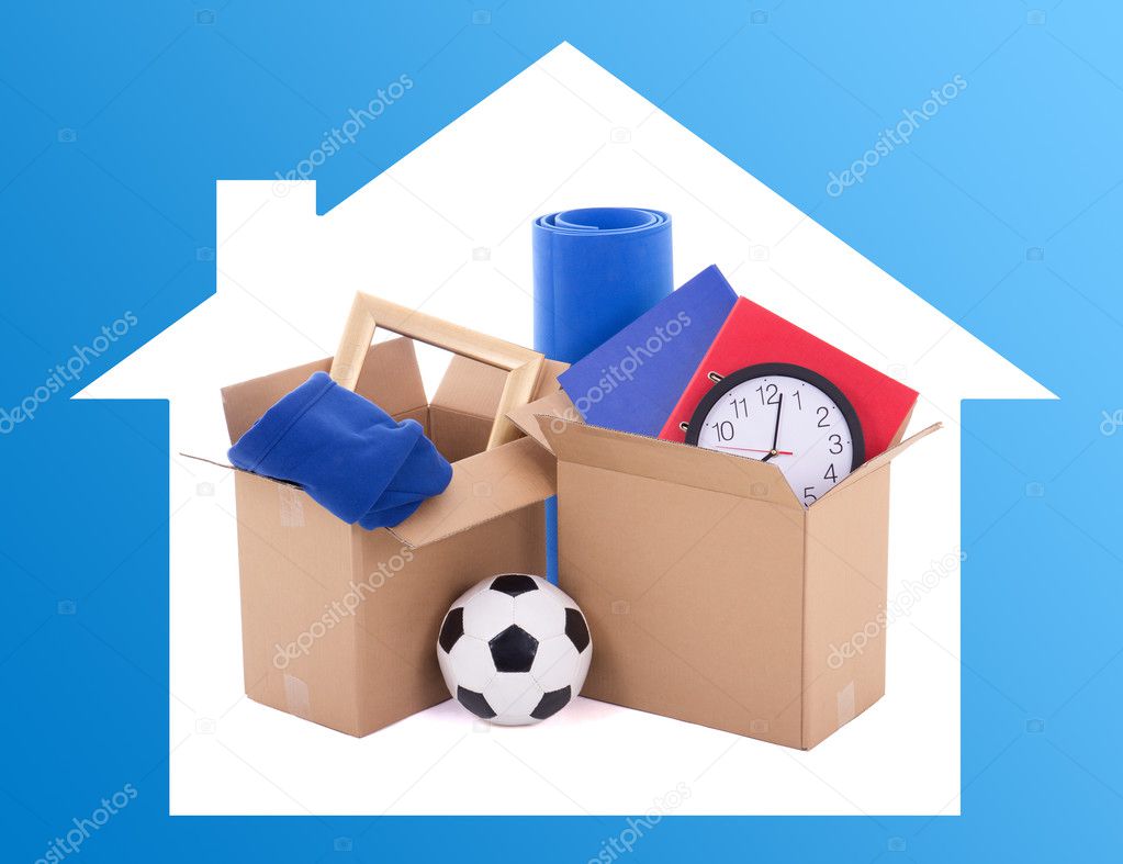 moving day concept - cardboard boxes with stuff 