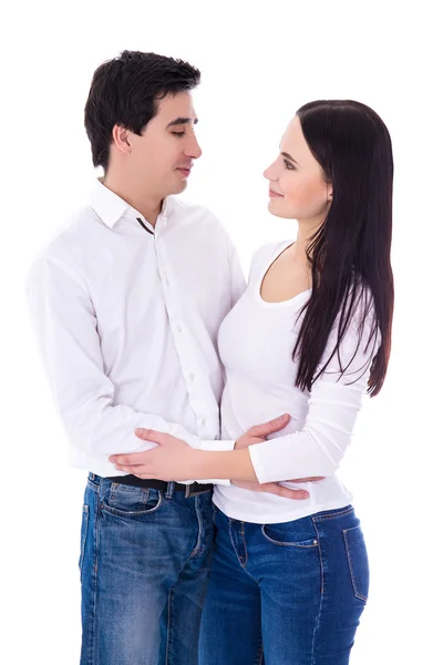 Relationship concept - young couple standing isolated on white — Stock Photo, Image