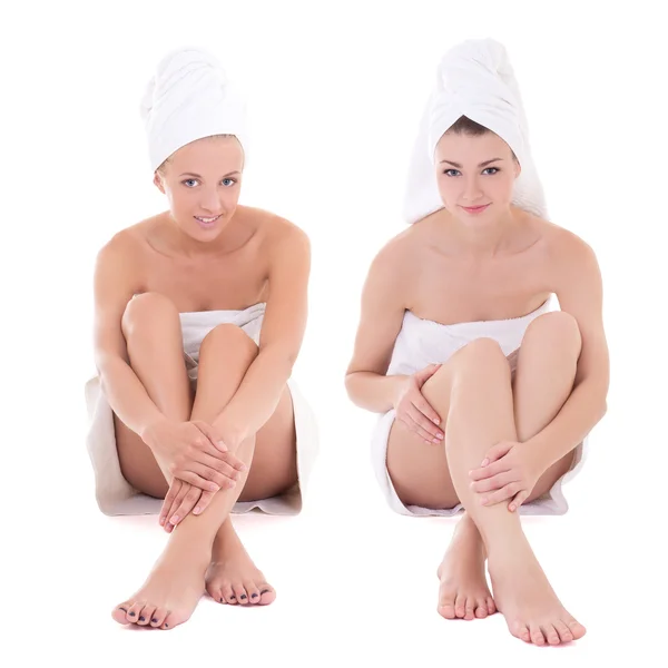 Skin and body care concept - two beautiful women covered in towe — Stock Photo, Image