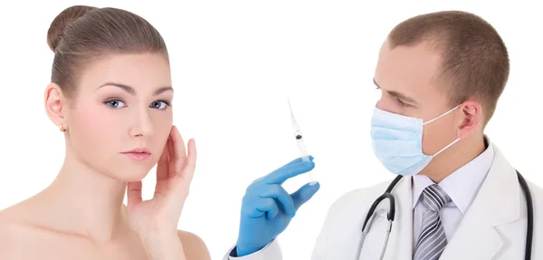 Doctor or beautitian in mask and blue gloves with syringe and wo — Stok Foto