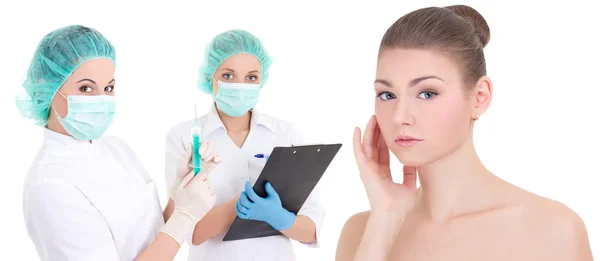 Plastic surgery concept - two female doctors and beautiful patie — Stock Photo, Image