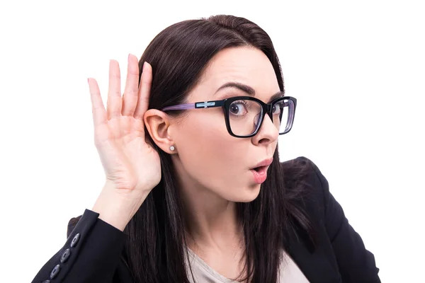 Gossip concept - young business woman overhears a conversation i — Stock Photo, Image