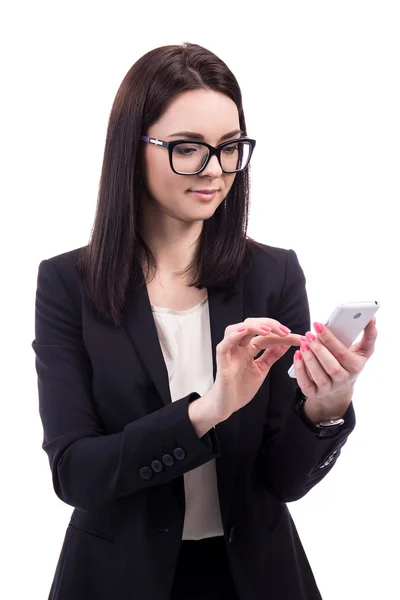 Jonge zakenvrouw met behulp van slimme telefoon geïsoleerd op wit — Stockfoto