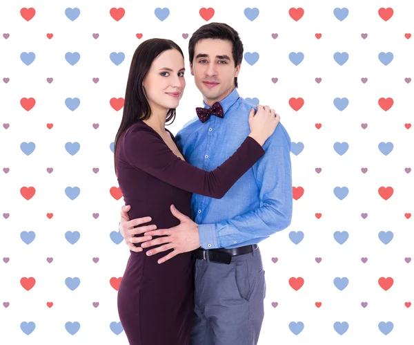 Ritratto di giovani coppie felici sopra priorità bassa di struttura con sente — Foto Stock