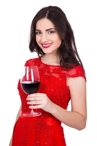 Retrato de mulher alegre no vestido vermelho com uma taça de vinho isola — Fotografia de Stock