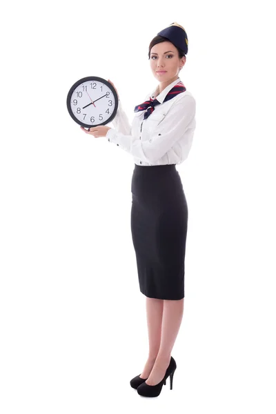 Portret van jonge stewardess met office klok geïsoleerd op wit — Stockfoto