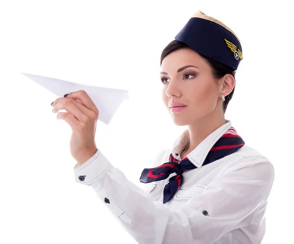 Portret van jonge stewardess papier vliegtuig geïsoleerd op whi te houden — Stockfoto