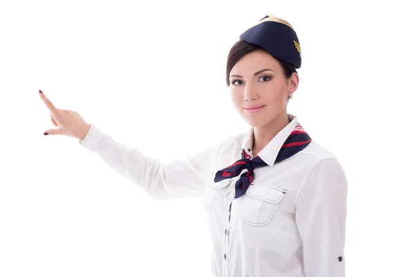 Portrait of stewardess in uniform pointing at something isolated — Stock Photo, Image