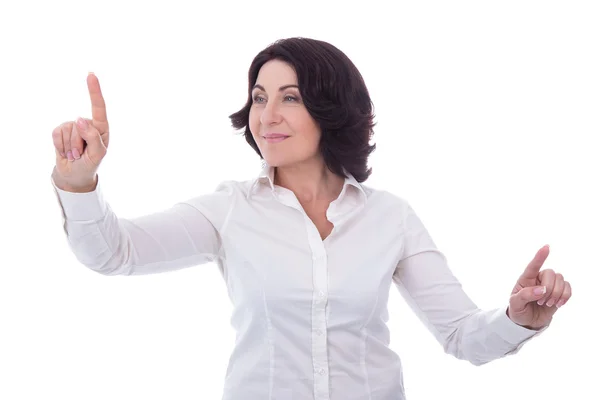 Portrait of mature business woman pointing at something isolated — Stock Photo, Image