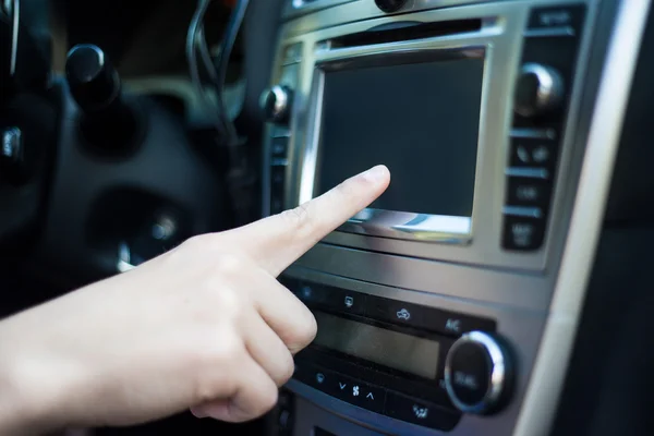 Male hand touching blank screen in car — Stock Photo, Image