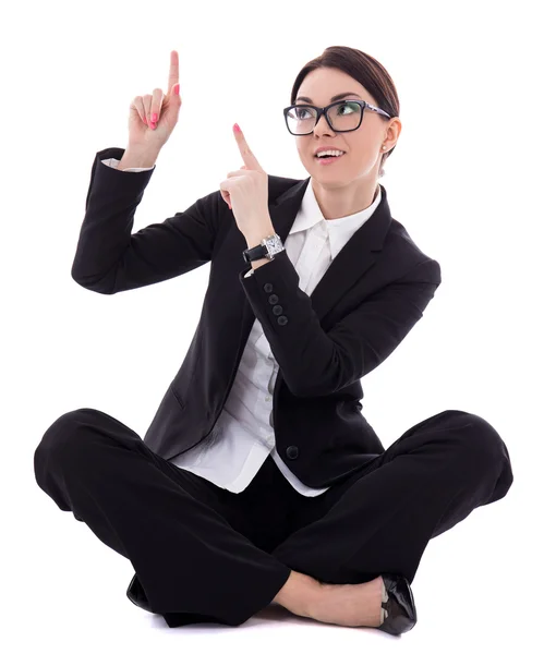 Young beautiful business woman sitting and pointing at something — Stock Photo, Image