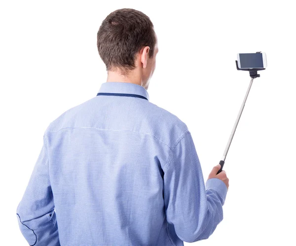 Hombre de negocios joven tomando selfie foto con el teléfono inteligente en autofe —  Fotos de Stock