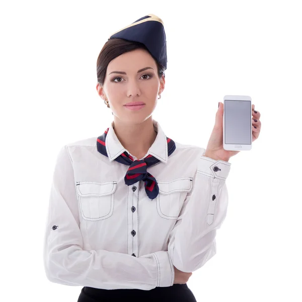 Boeking van de concept - jonge stewardess bedrijf smartphone met blan — Stockfoto