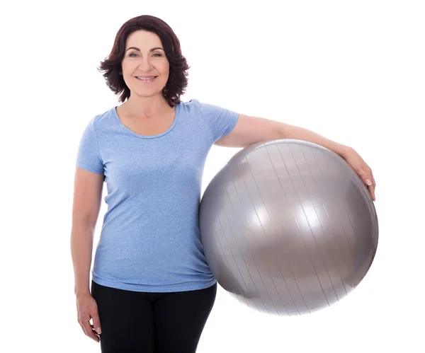 Portrait of mature woman with fitness ball isolated on white — Stock Photo, Image