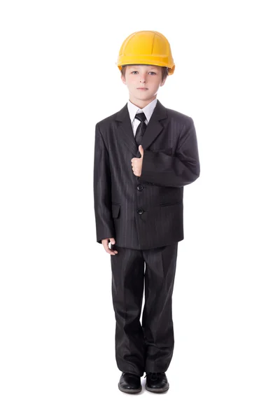 Little boy in business suit and builder's helmet isolated on whi — Stock Photo, Image