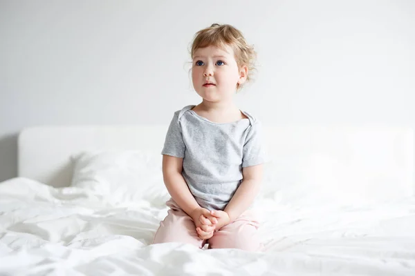 Portrait Cute Little Girl Sitting Bed Dreaming Thinking Something — Stock Photo, Image