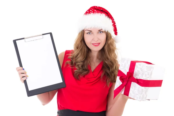 Young woman in santa hat holding clipboard with copyspace and pr – stockfoto
