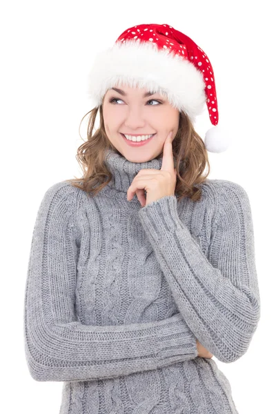 Kış giysileri ve santa şapka rüya gülümseyen güzel kadın — Stok fotoğraf