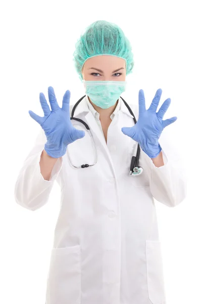 Frightening female doctor in surgeon mask and rubber gloves isol — Stock Photo, Image