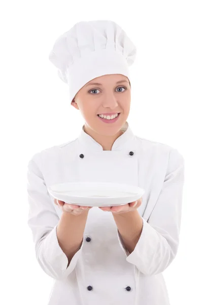 Jovem chef de cozinha uniforme apresentando prato vazio isolado no whi — Fotografia de Stock