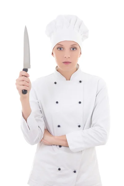 Mujer joven en uniforme de chef sosteniendo el cuchillo aislado en blanco —  Fotos de Stock