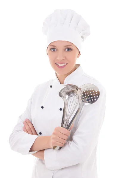 Frau in Chef einheitliche mit Kücheneinrichtungen isoliert auf weiss — Stockfoto