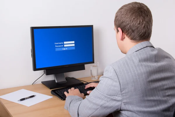 Social network concept - business man using personal computer — Stock Photo, Image