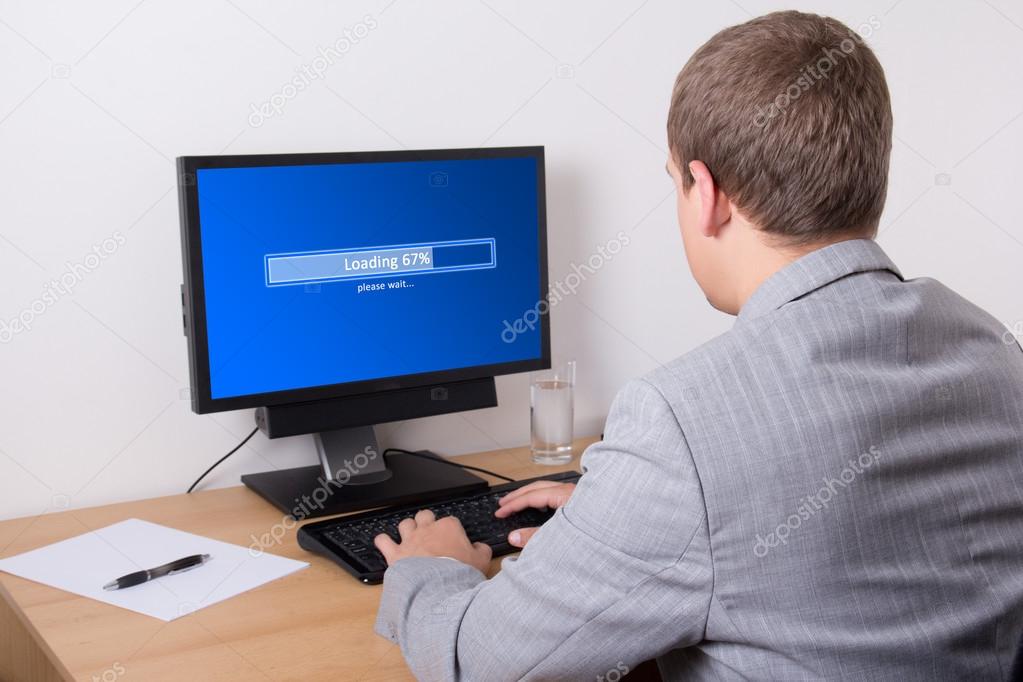 business man downloading something from internet using personal 